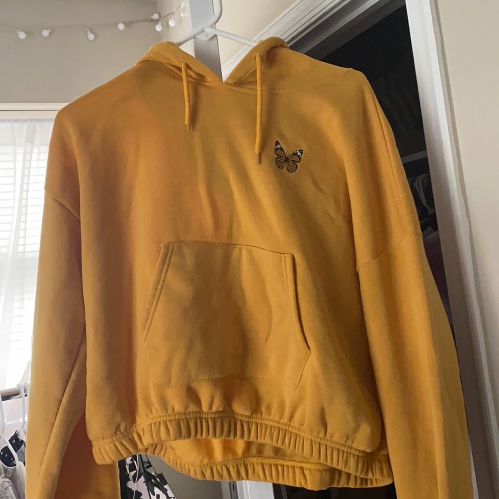 Yellow cropped sweatshirt with monarch butterfly